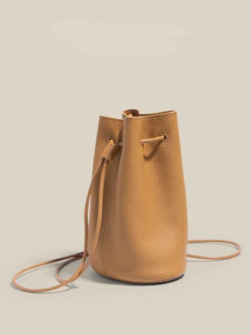 Fashion Cowhide Minority All-Match Casual Messenger Bags New Drawstring Solid Bucket Simple Commuter Exquisite Single-Shoulder