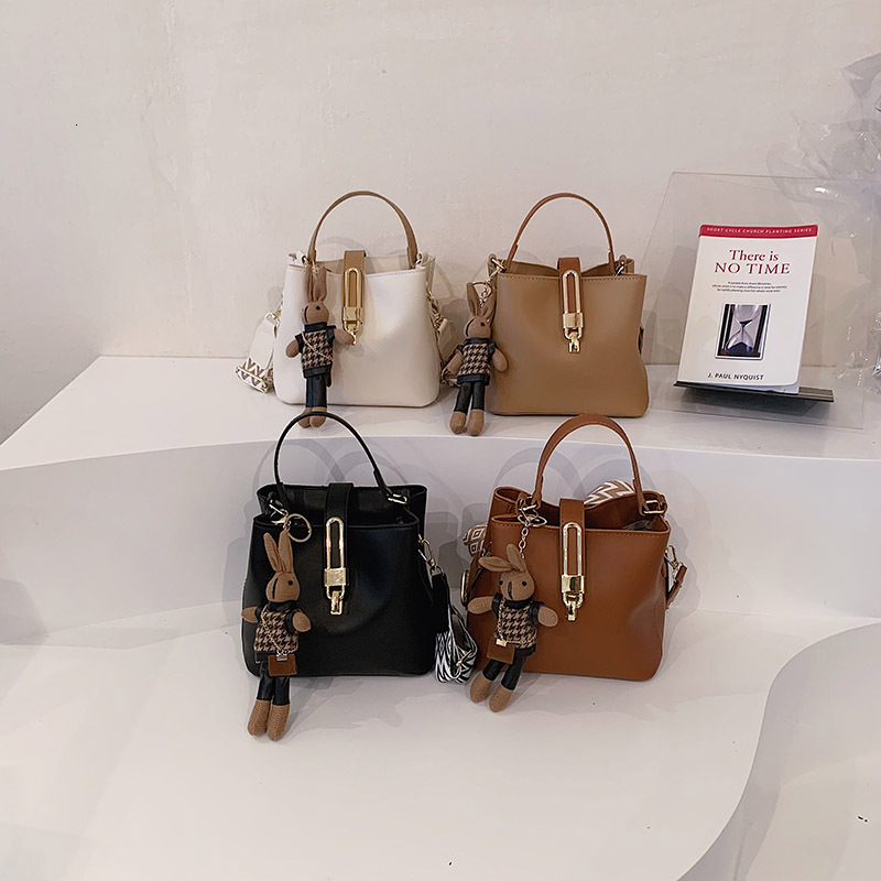 Shoulder new fashionable texture hand-held bucket Korean version trendy solid color crossbody women's small bag