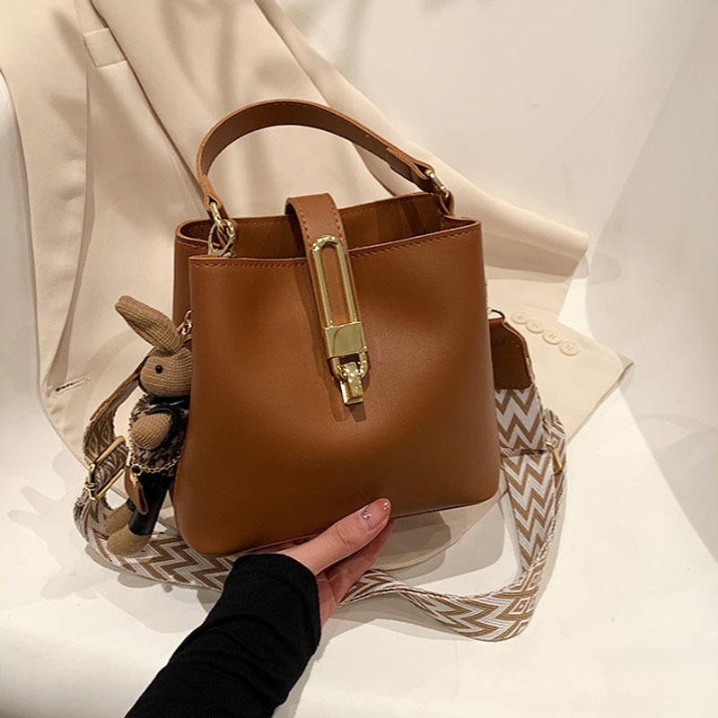 Shoulder new fashionable texture hand-held bucket Korean version trendy solid color crossbody women's small bag