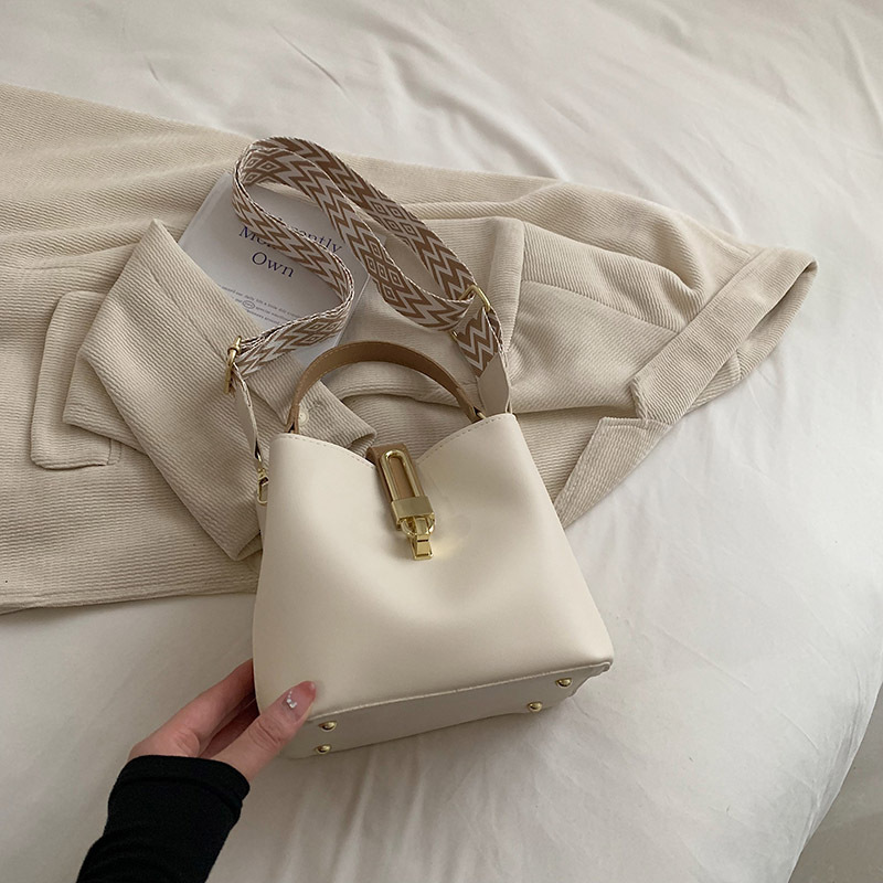 Shoulder new fashionable texture hand-held bucket Korean version trendy solid color crossbody women's small bag