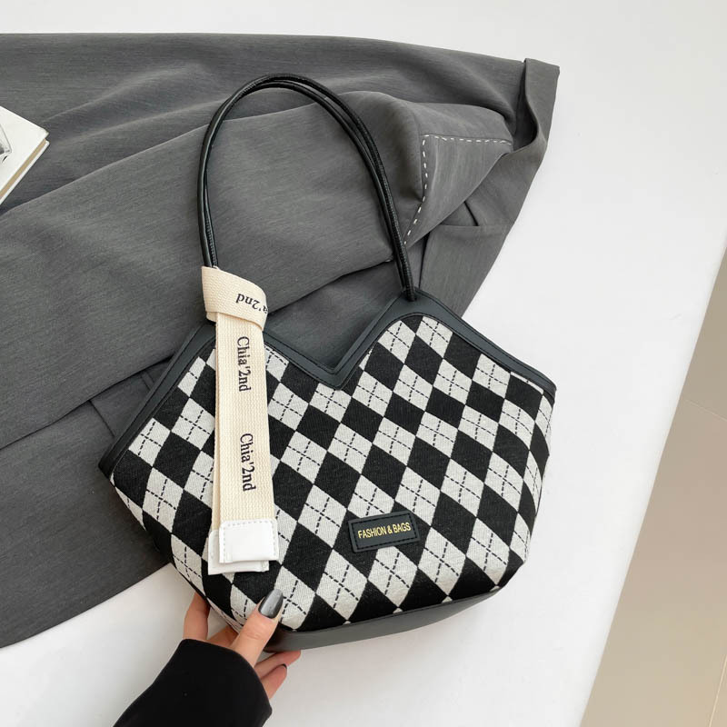Fashion large capacity single shoulder women 2025 new summer hot senior sense commuter bucket bag checkerboard Geometric shape free shipping
