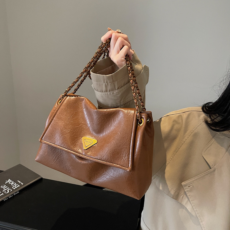 Free Shipping 2025 New Free Shipping Designer Single Shoulder Bag Vintage Solid Color Casual Versatile Tote Package For Women White Designer Bag Luxur
