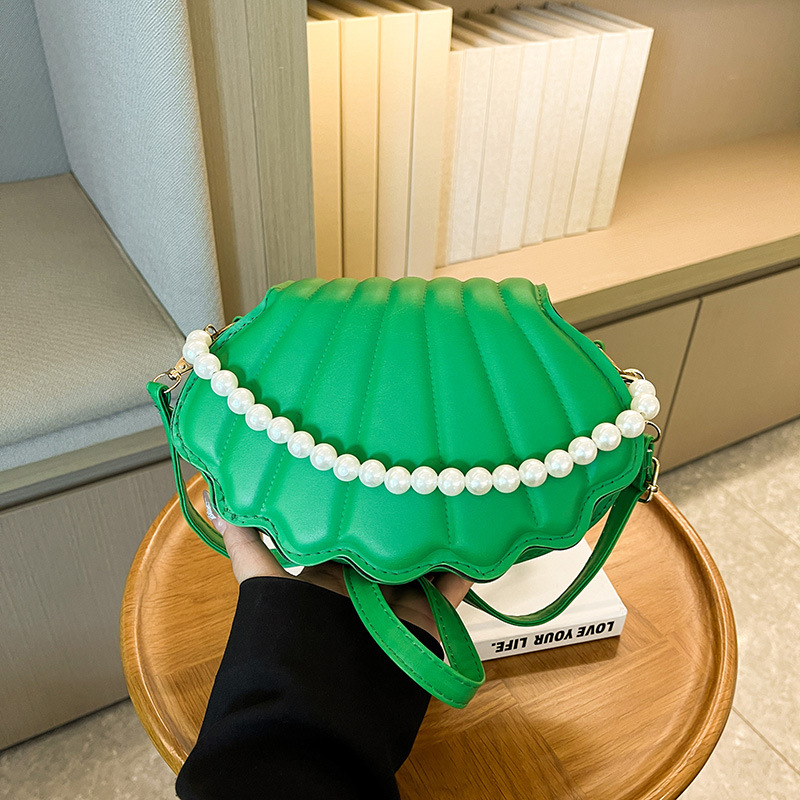 Chic Mini Shell Handbag with Adjustable Chain Straps Compact and Stylish Shoulder Accessory