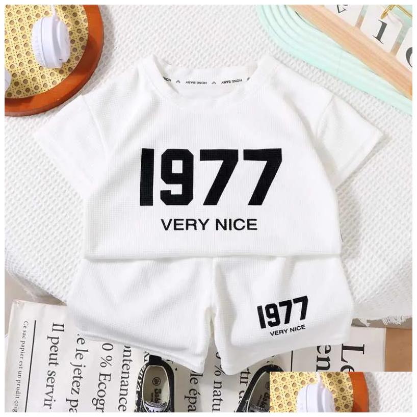 T-shirts Clothing Sets Summer Baby Boy Clothes Set Children Girls Letter Tshirt And Shorts 2 Pieces Suit Kid Short Sleeve Top Bottom Outfits Ot3InY250