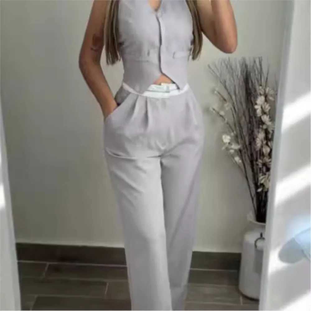 Womens 2 Piece Ele Comting V-Neck Buttoned Vest Top And Contrast Paneled High Waist Pocket Design Wide Leg Pants SuitXJ250106