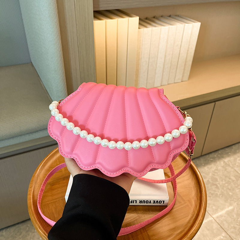 Chic Mini Shell Handbag with Adjustable Chain Straps Compact and Stylish Shoulder Accessory