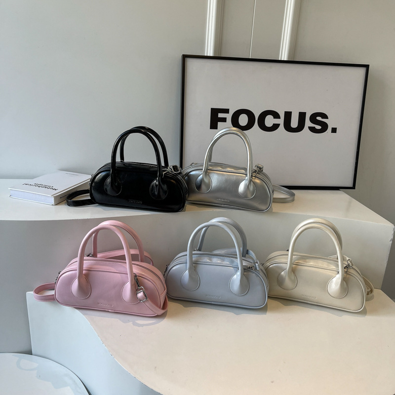 2025 new free shipping designer Single shoulder bag baguette Vintage solid color casual versatile Tote package fashionable women black white pink