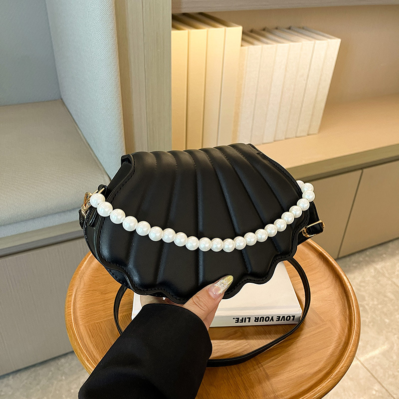 Chic Mini Shell Handbag with Adjustable Chain Straps Compact and Stylish Shoulder Accessory