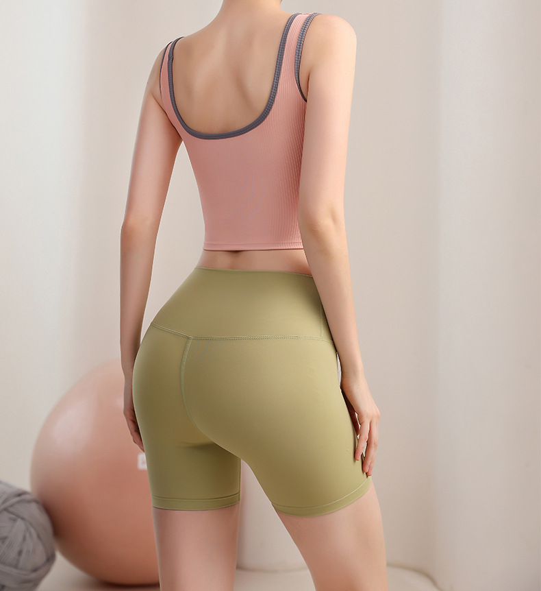 Ladies' high waisted, hip lifting quick drying elastic seamless nude fitness pants with pockets three part pants without awkward lines sports pan