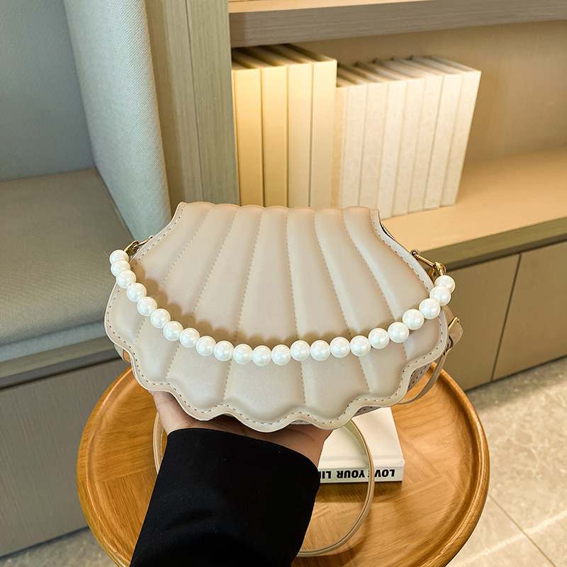 Chic Mini Shell Handbag with Adjustable Chain Straps Compact and Stylish Shoulder Accessory