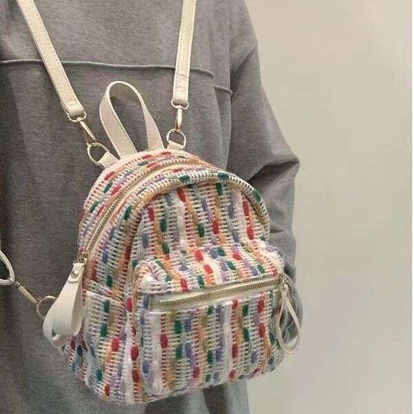 2025S Designer S New Model Rainbow Knitted Internet Red Spring Summer New High End Sense Small Crowd Travel Backpack Fashion Mini Bag