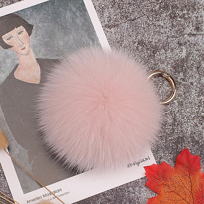 2024 Real Fox Fur Keychain Natural Fur Pompom Ball Women Bag ornaments Pendant Car Key Ring Leather Strap Metal Ring Gift 250107