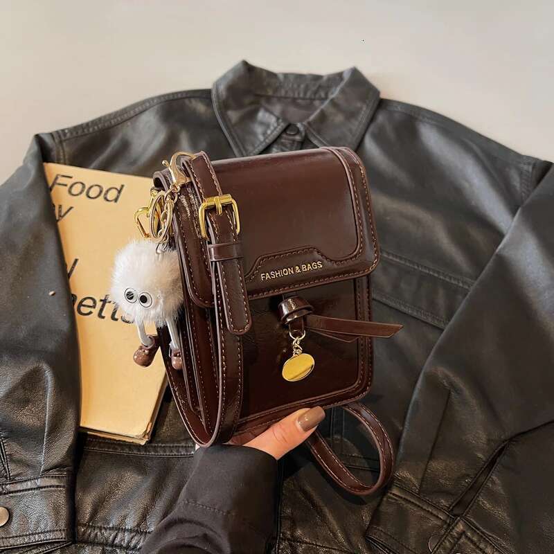 Avant garde fashion multifunctional solid color PU small square new designer simple hot selling shoulder bag commuting fashion exquisite crossbody bag