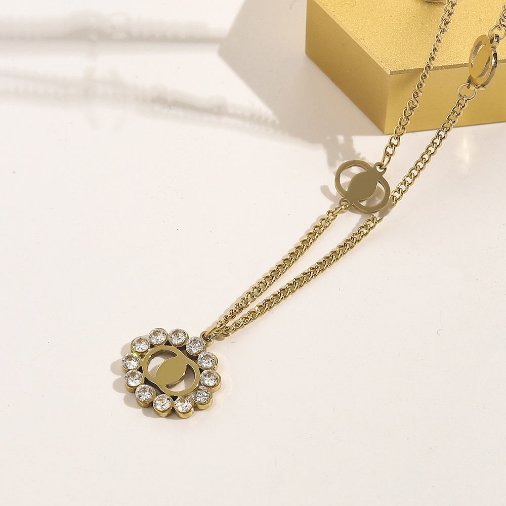 Stylish Women Gold Tone Charm Necklace, Fashion Jewelry with Initial and Symbol Pendants Long Chans, Trendy Accessory for Everyday Wear.