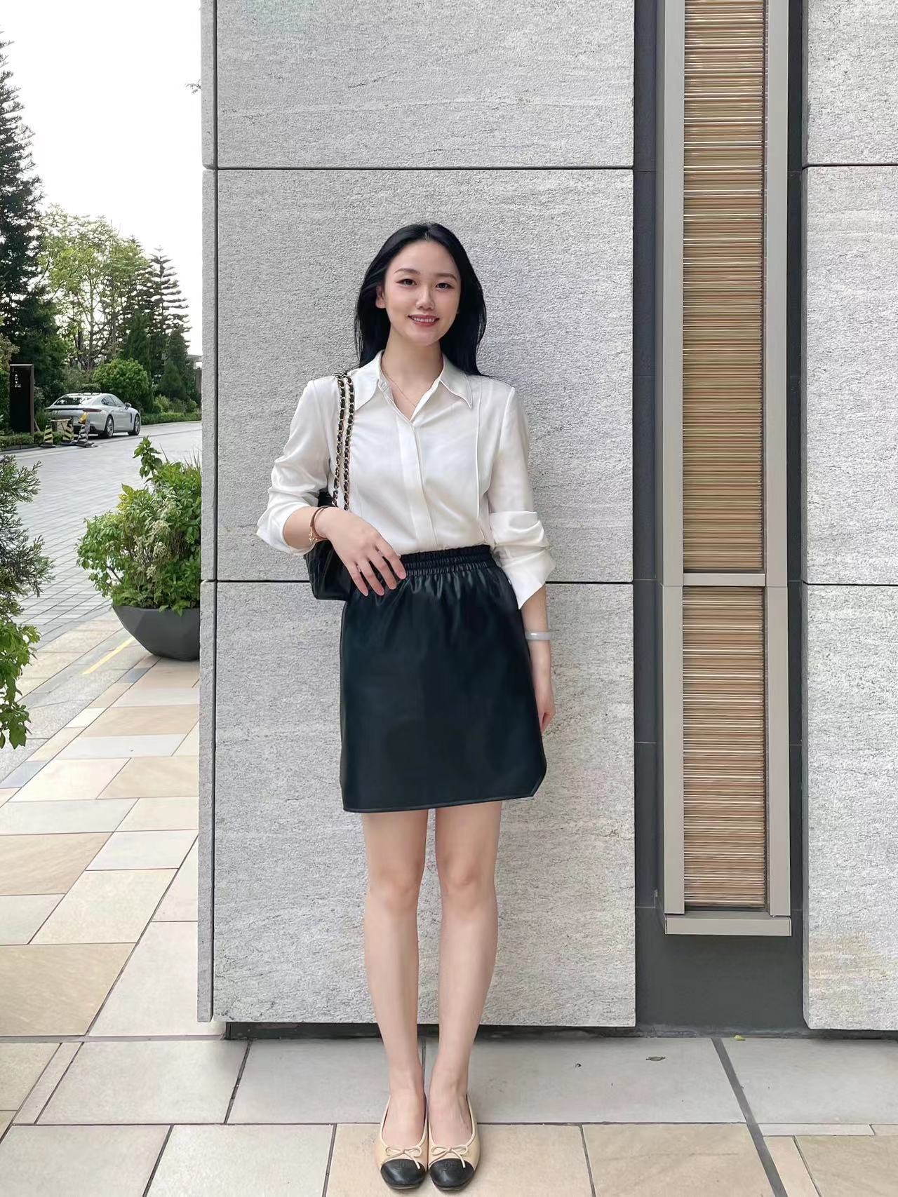 D86890 Winter temperament commuting elastic waist PU leather short skirt loose high skirt female hip skirt