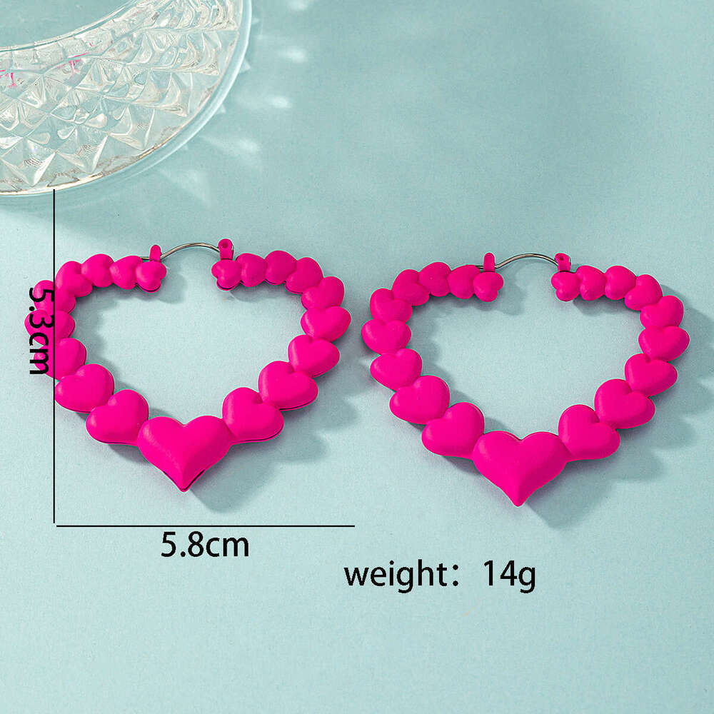 Peach rose red temperament heart exaggerated dragon fruit color niche female design cute earrings