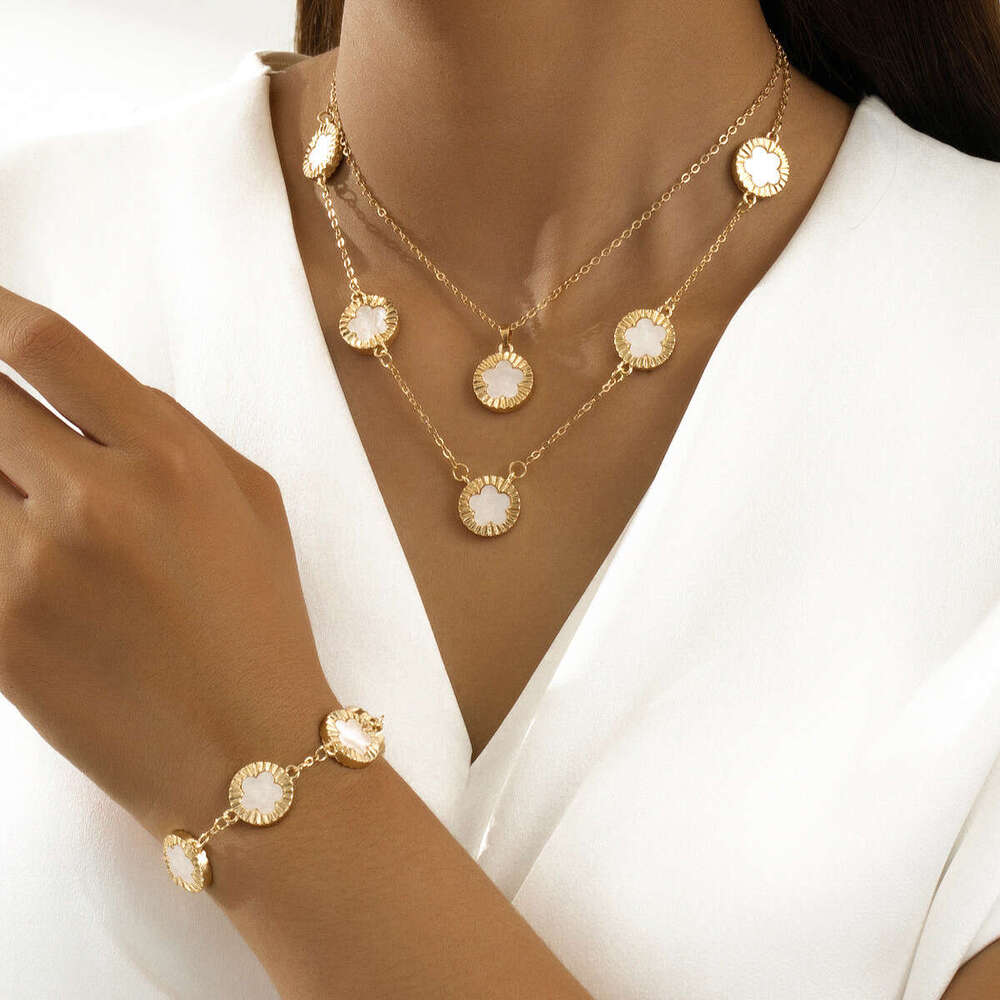 TEMU's new leaf clover bracelet necklace set exudes an elegant temperament with a five petal wer pendant and accessories for women