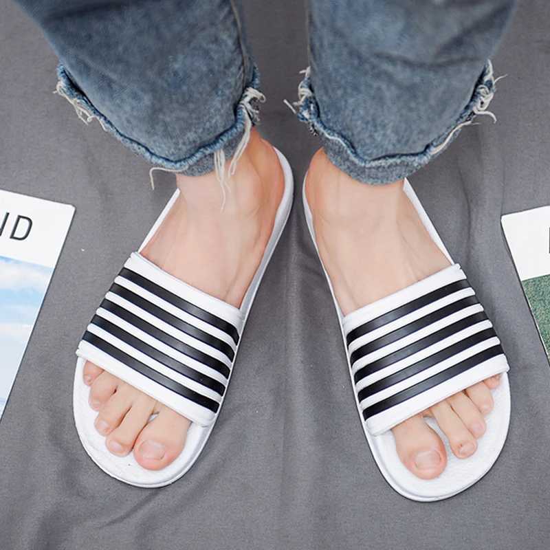 Slippers brand mens summer striped pool slider couple casual slider beach large-size sandals unprinted shoes indoor bedroom shoes M250108