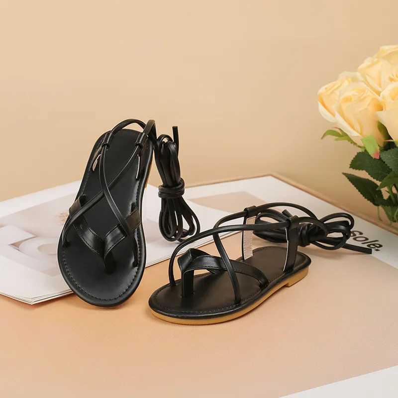 2024 New Womens Shoes Black Cross Belt Roman Sandals Summer Soft Bottom Comfortable Childrens Princess Shoes Flat Shoes Casual Flip Cover W250108
