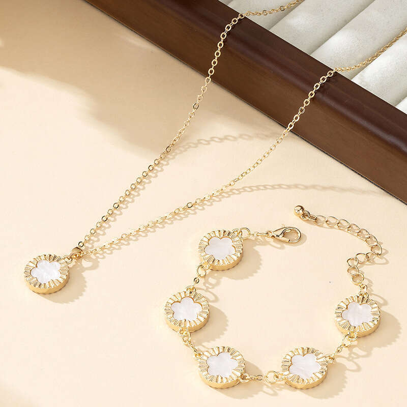 TEMU's new leaf clover bracelet necklace set exudes an elegant temperament with a five petal wer pendant and accessories for women
