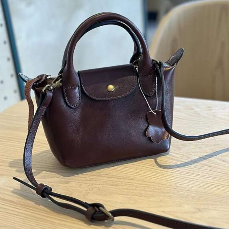 2025 Spring/Summer Vegetable Tanned Cow Leather Women's Hand Bill Shoulder Bag Leather Casual Fashion Mini Crossbody Bag