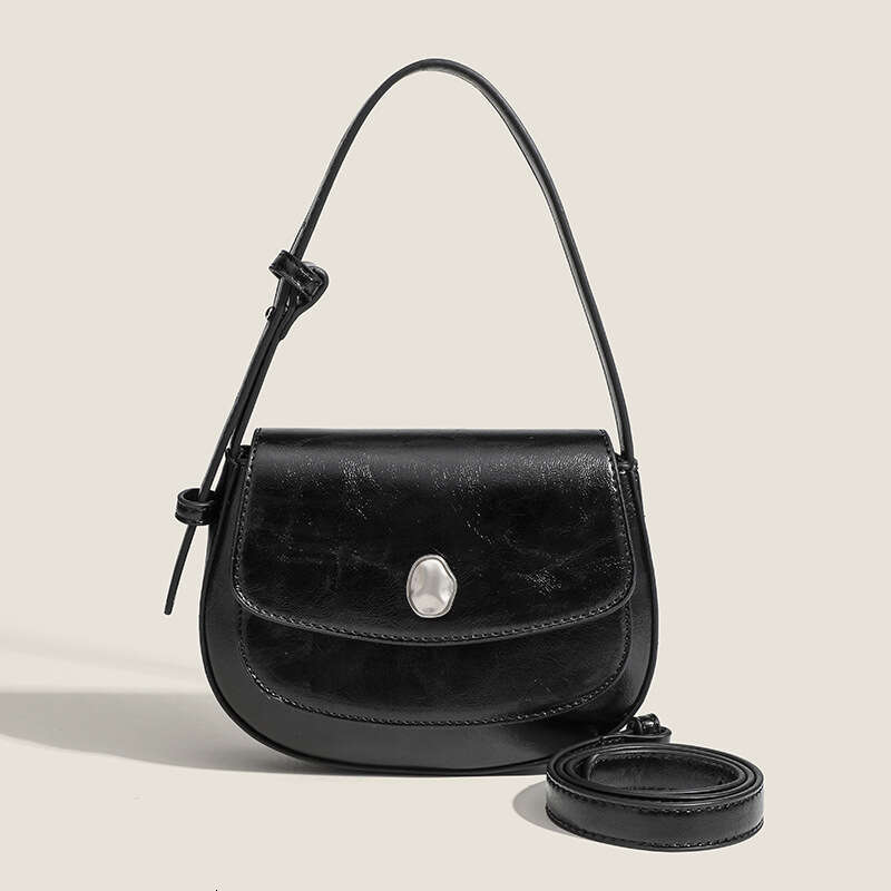 Korean Ins niche high-end semi-circular underarm with versatile temperament, saddle shoulder crossbody bag, hand-held bag