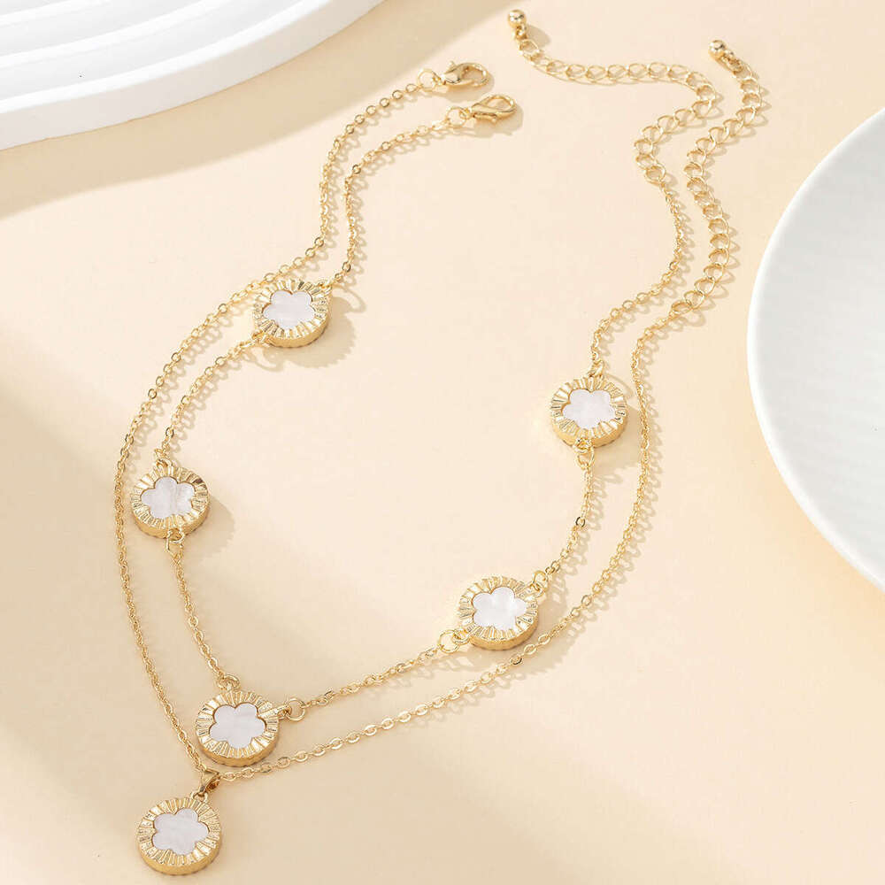 TEMU's new leaf clover bracelet necklace set exudes an elegant temperament with a five petal wer pendant and accessories for women