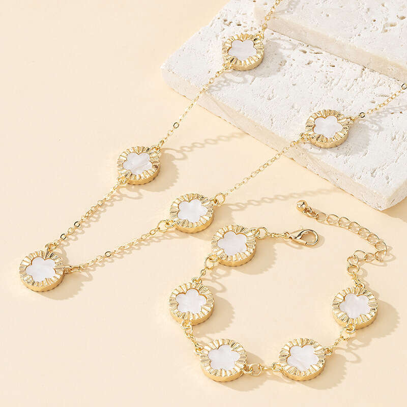 TEMU's new leaf clover bracelet necklace set exudes an elegant temperament with a five petal wer pendant and accessories for women