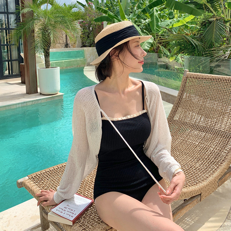 2025 New Black French Minimalist Triangle Designer Conservative Strap Pants Collection Tight Hot Spring Resort jumpsuit