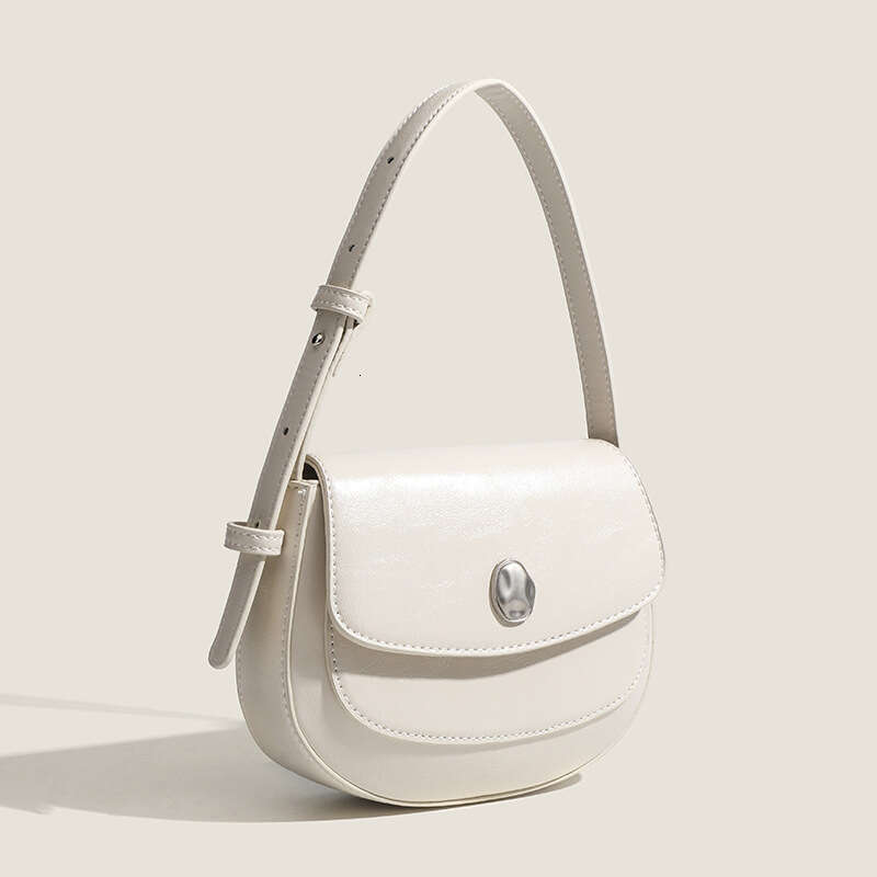 Korean Ins niche high-end semi-circular underarm with versatile temperament, saddle shoulder crossbody bag, hand-held bag