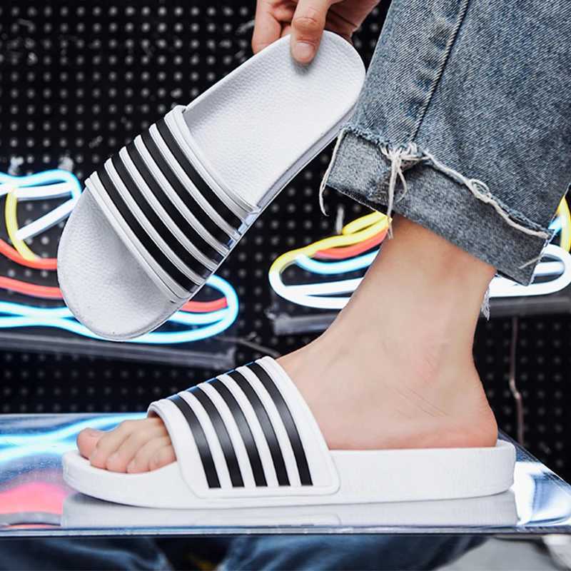 Slippers brand mens summer striped pool slider couple casual slider beach large-size sandals unprinted shoes indoor bedroom shoes M250108