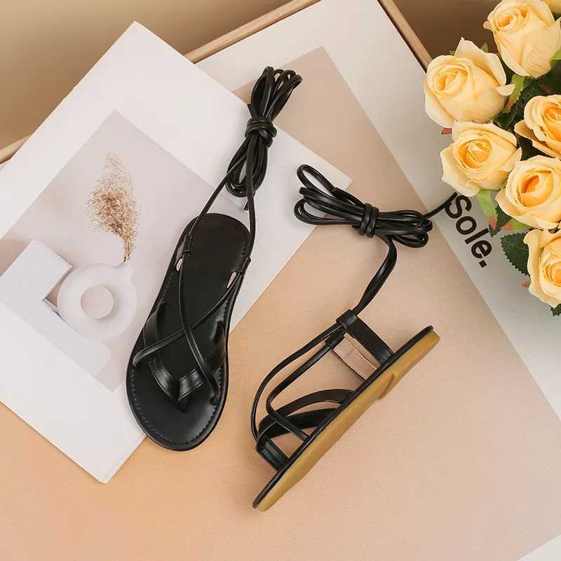 2024 New Womens Shoes Black Cross Belt Roman Sandals Summer Soft Bottom Comfortable Childrens Princess Shoes Flat Shoes Casual Flip Cover W250108