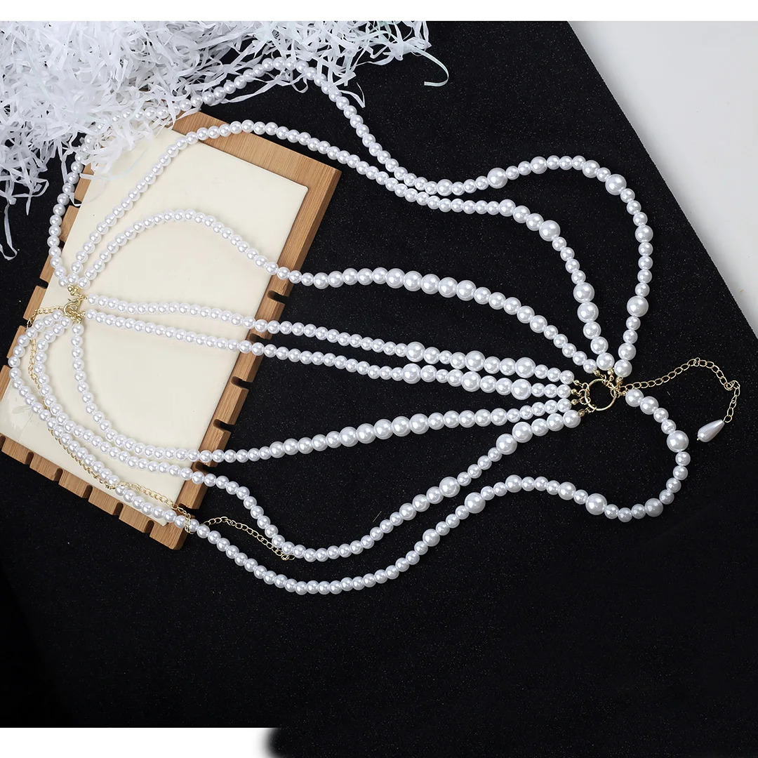 European and American decorative chain body chain imitation pearl hollow multi-layer fringe female size staggered waist chain 250107