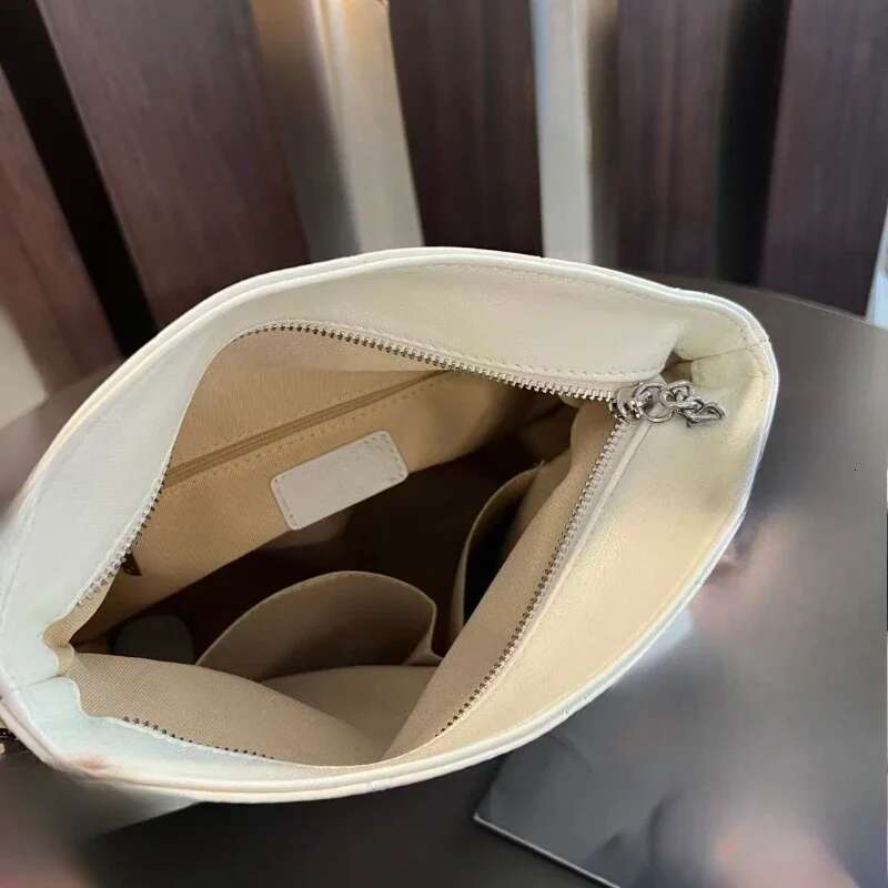 2025 New Sheepskin Genuine Leather Women's Fashion Commuter Pure Colour Armpit Single Shoulder Bags Crossbody