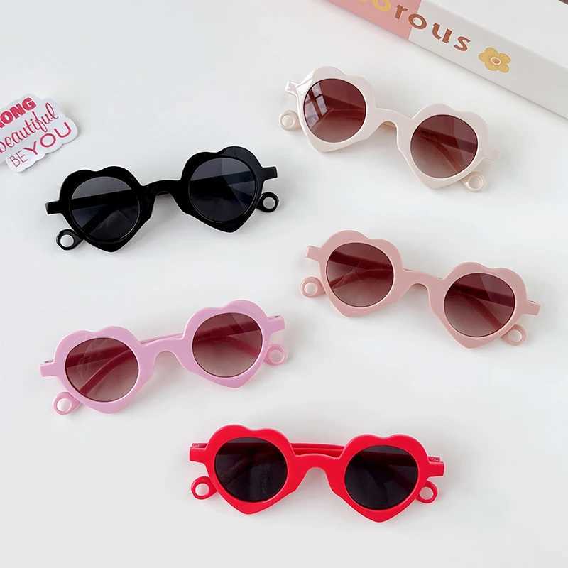 2024 Cute Heart shaped Hollow Sunglasses for Girls and Boys UV400 Childrens Fashion Outdoor Sunscreen Glasses Childrens Sunglasses W250109