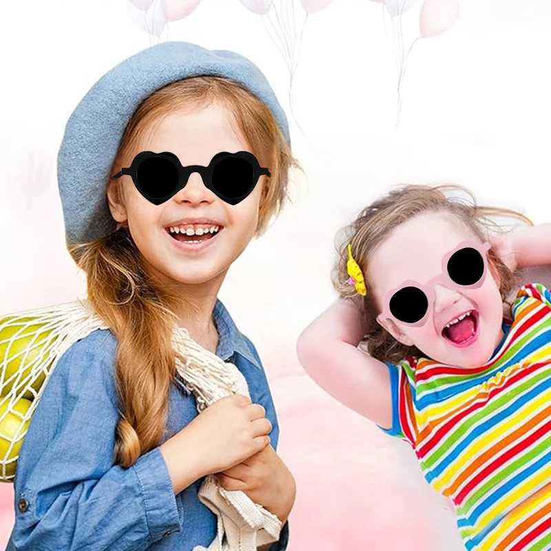 2024 Cute Heart shaped Hollow Sunglasses for Girls and Boys UV400 Childrens Fashion Outdoor Sunscreen Glasses Childrens Sunglasses W250109