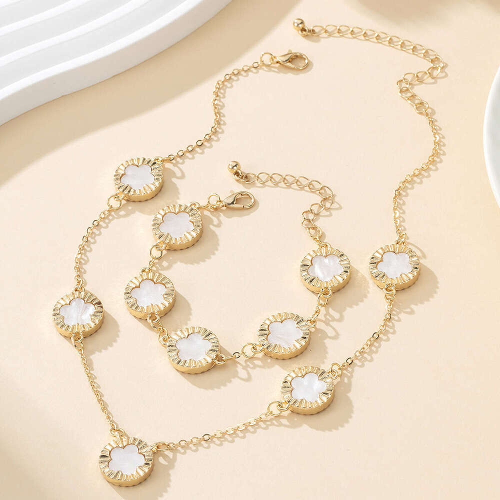 TEMU's new leaf clover bracelet necklace set exudes an elegant temperament with a five petal wer pendant and accessories for women
