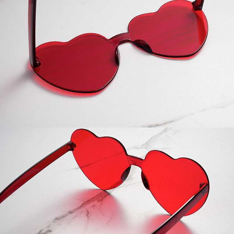 Free delivery 2023 candy colored heart-shaped ocean person frameless childrens sunglasses fashion candy love sunglasses W250109