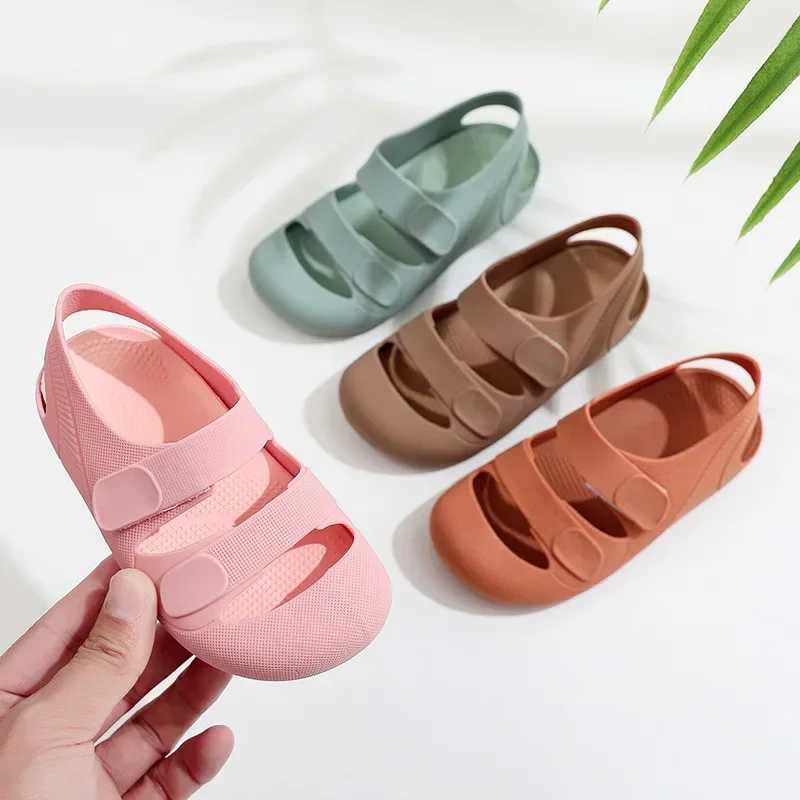 Childrens sandals with hollow closed toes breathable candy colored Roman sandals suitable for boys and girls soft and non slip childrens shoes W250108