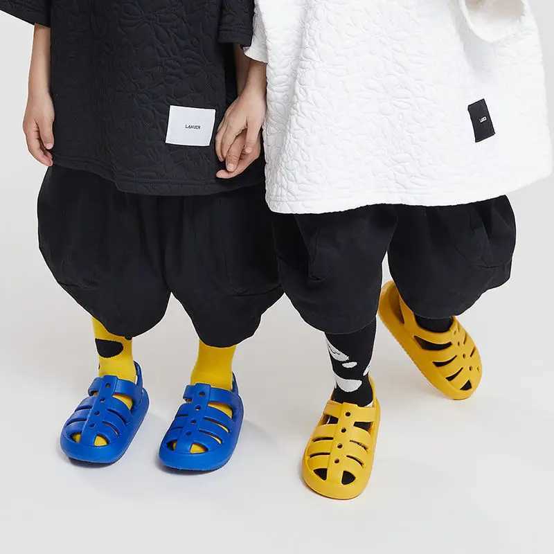 Childrens Roman sandals summer breathable hollow childrens shoes boys and girls anti slip soft soled beach shoes W250108