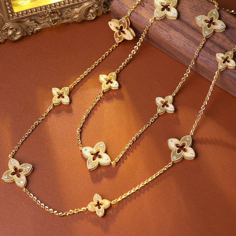 New style designer Drawing process hollowed out lucky clover earring bracelet for women high-end feel light necklace sweater chain earring 4/ Leaf jew