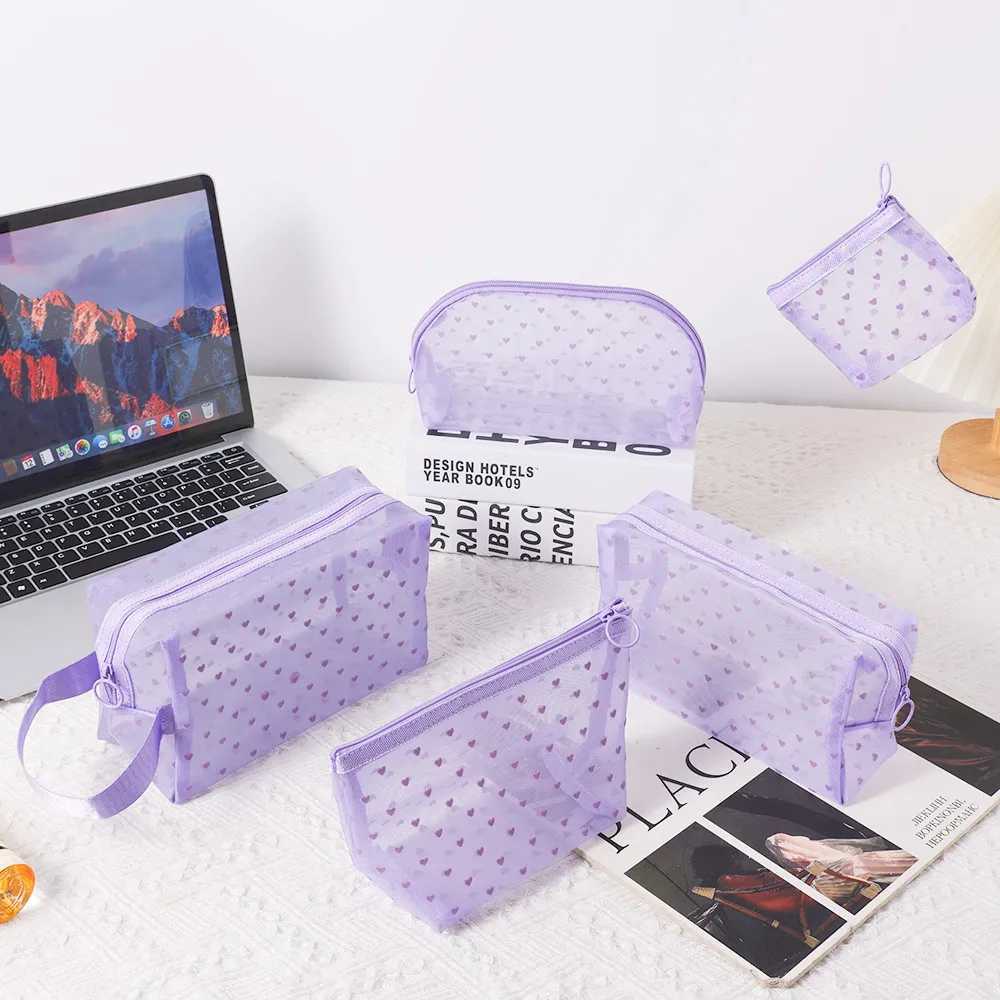 One fashionable transparent mesh cosmetic bag Womens heart mini cosmetic lipstick storage bag Breathable travel toilet zipper bag W250109