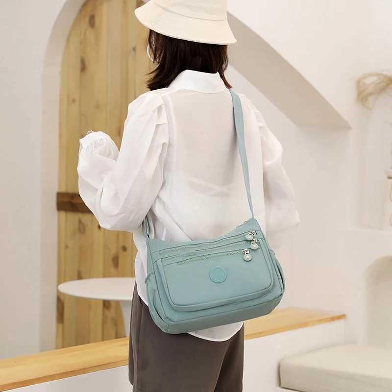 Womens Messenger large capacity Shoulder Bag Polyer Fi Cosmetic Bag Simple and Versatile Handbag Crossbody BagXJ250108