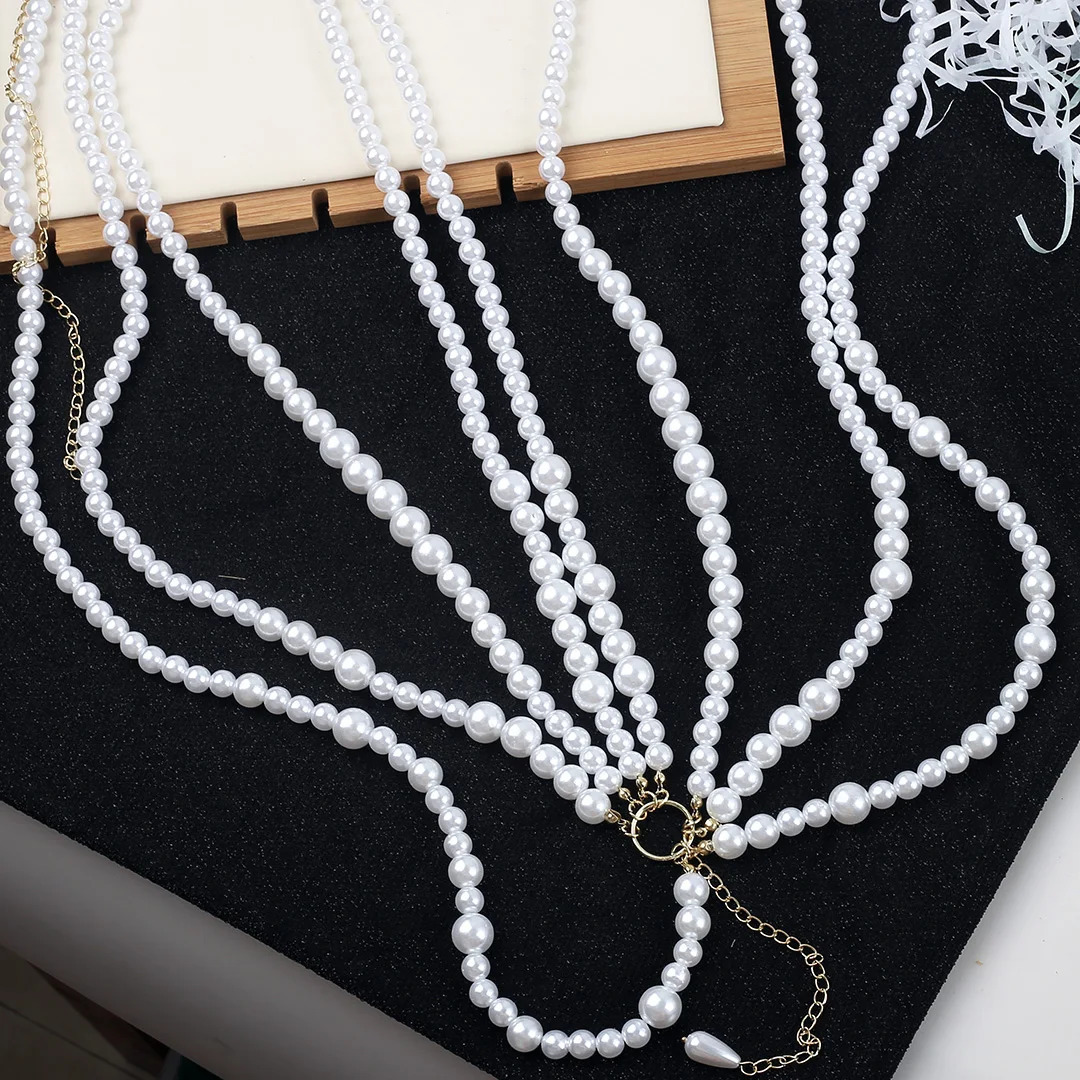 European and American decorative chain body chain imitation pearl hollow multi-layer fringe female size staggered waist chain 250107
