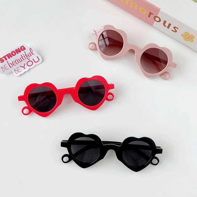 2024 Cute Heart shaped Hollow Sunglasses for Girls and Boys UV400 Childrens Fashion Outdoor Sunscreen Glasses Childrens Sunglasses W250109