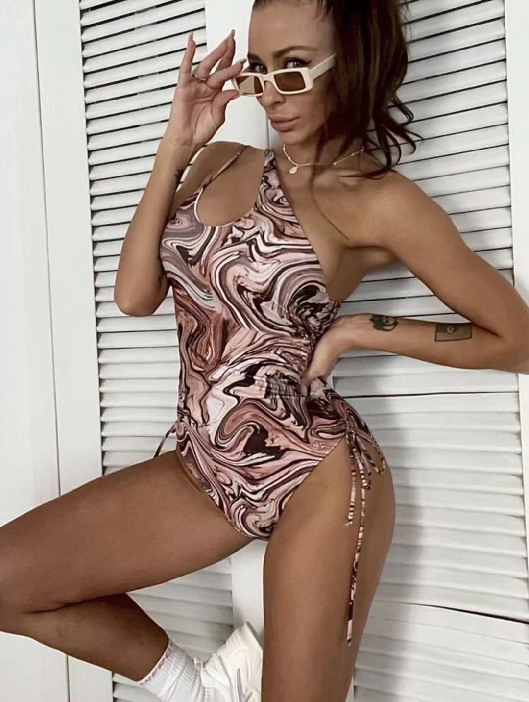 2025 women's spiral printed one-piece swimsuit paired with sexy drawstring bikini designer trendy beach swimsuit