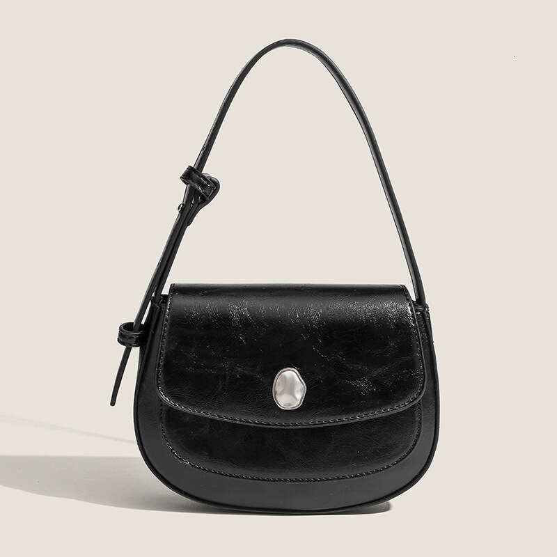 Korean Ins niche high-end semi-circular underarm with versatile temperament, saddle shoulder crossbody bag, hand-held bag