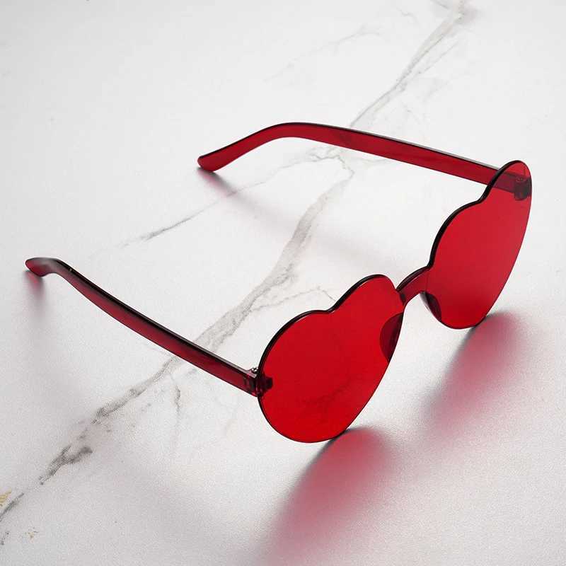 Free delivery 2023 candy colored heart-shaped ocean person frameless childrens sunglasses fashion candy love sunglasses W250109