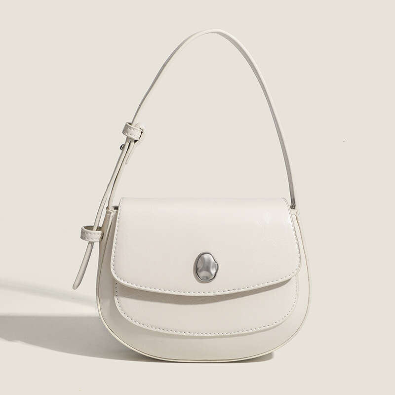 Korean Ins niche high-end semi-circular underarm with versatile temperament, saddle shoulder crossbody bag, hand-held bag