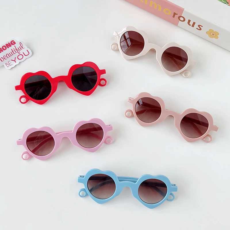 2024 Cute Heart shaped Hollow Sunglasses for Girls and Boys UV400 Childrens Fashion Outdoor Sunscreen Glasses Childrens Sunglasses W250109